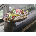 Vinilo Sticker bomb/Hellaflush en retrovisor