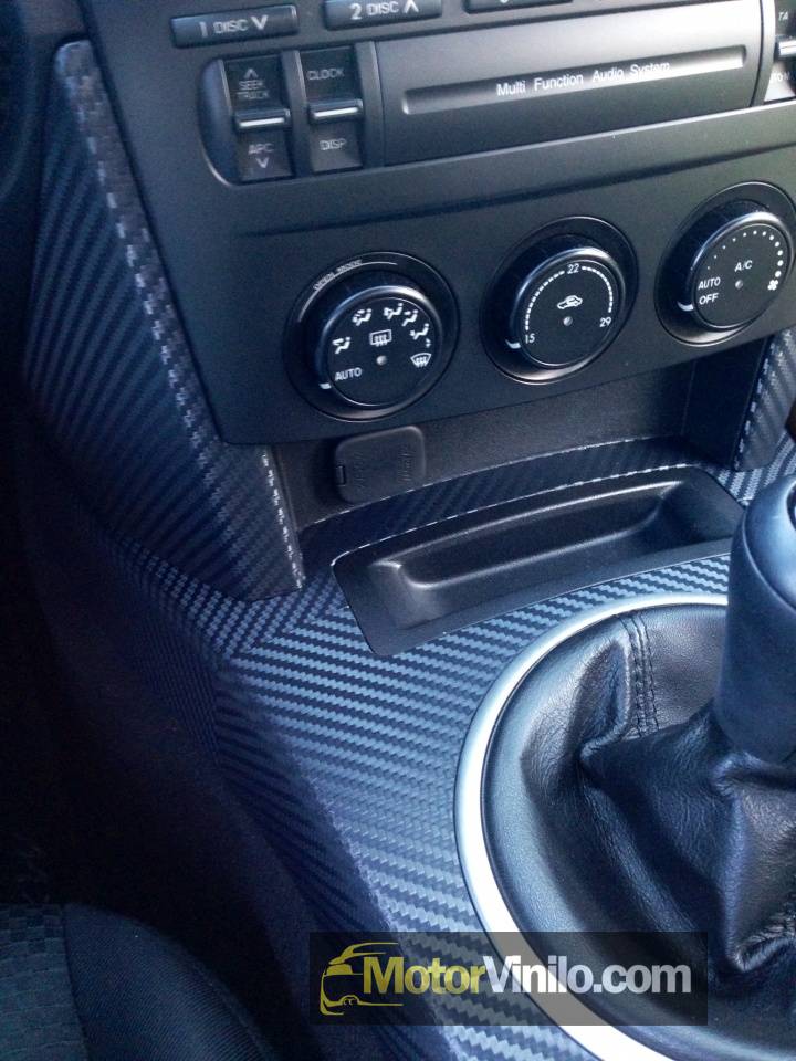 Una buena amiga cómo dulce Interior de un Mazda mx5 con vinilo de fibra de carbono